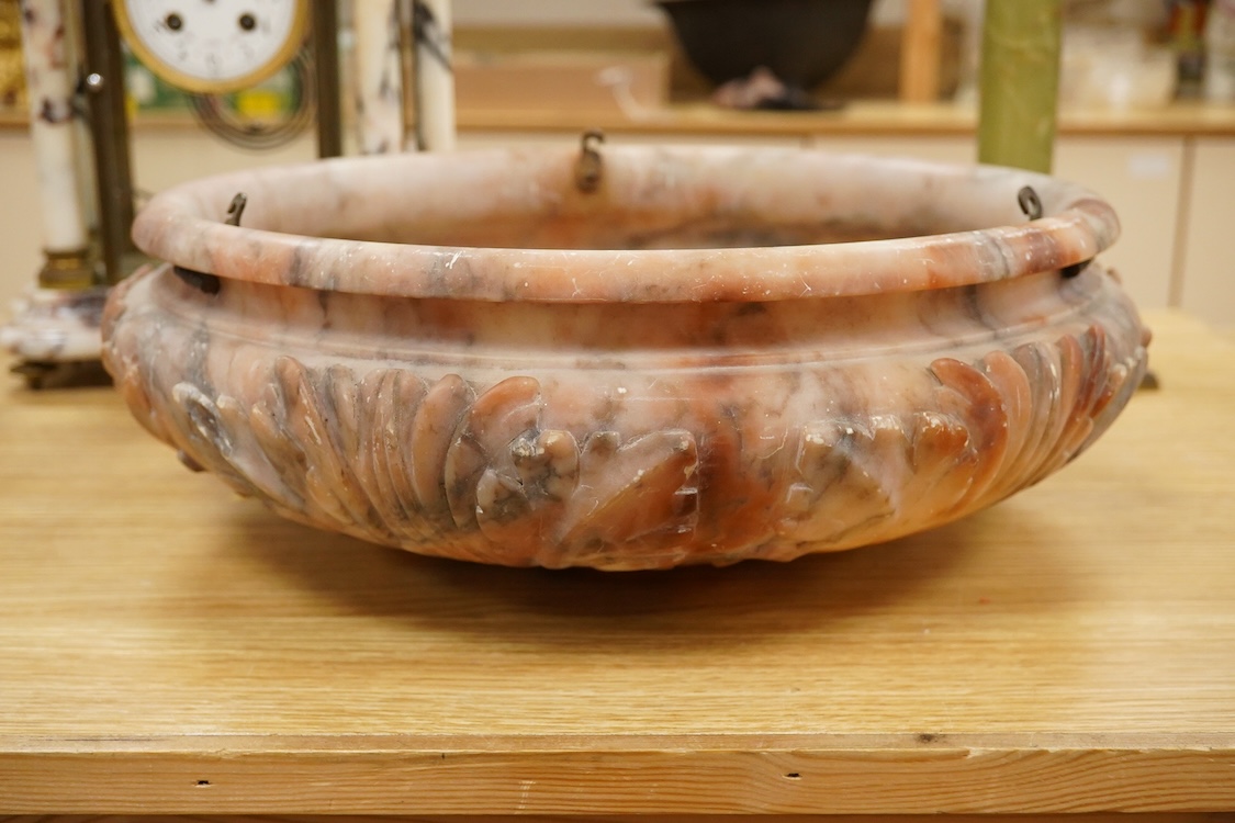 A carved alabaster ceiling shade, 39cm in diameter